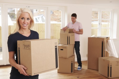 Careful loading of desks and boxes during office removals in Harrow