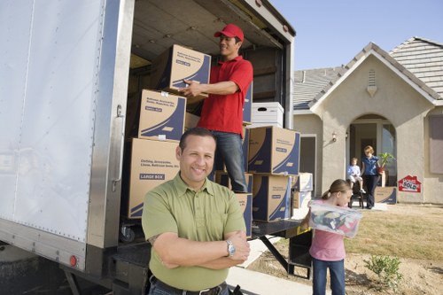 Movers planning a house move with a van in Harrow