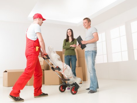 Moving van prepared for a local Harrow move with boxes and furniture