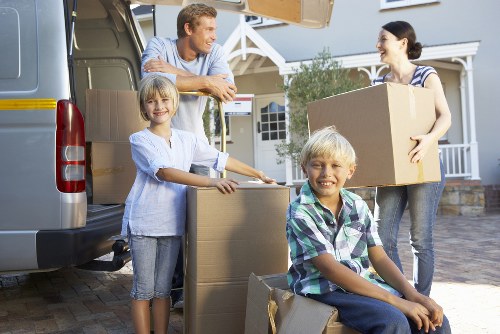 Household boxes and furniture prepared for transport in Harrow