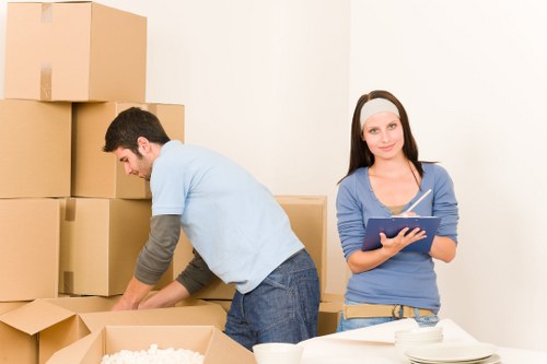 Harrow Man And Van movers working carefully with furniture