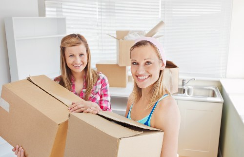 Prepared moving boxes and household items ready for relocation in Harrow