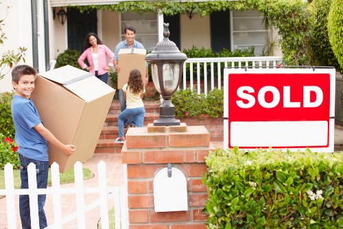 Careful loading of household items for a Harrow collection and delivery