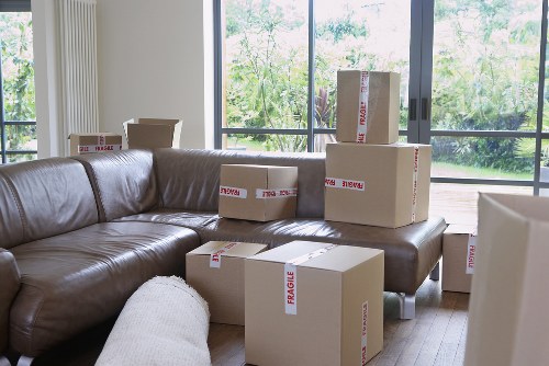 Careful furniture handling during a house move in Harrow